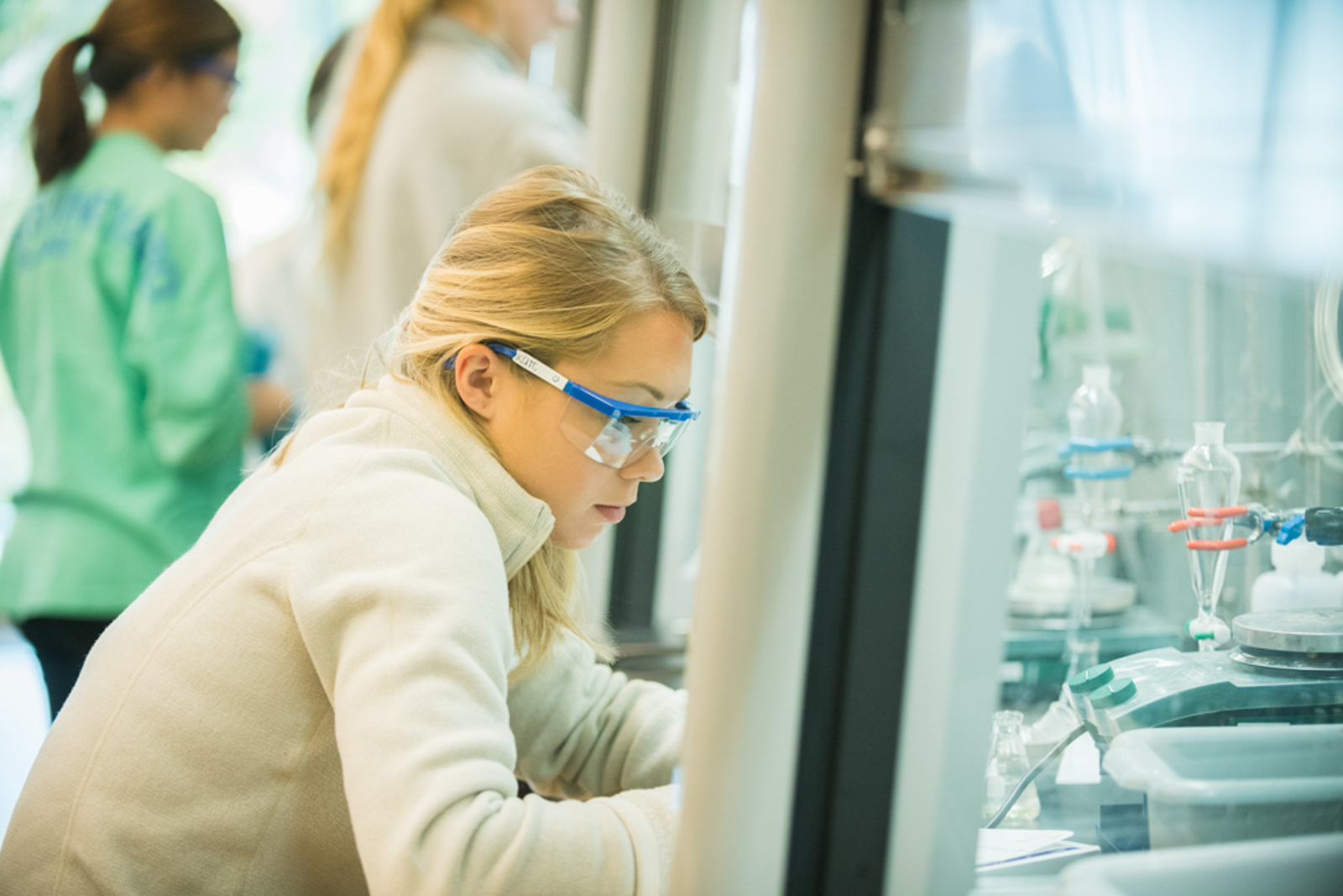 Student working in lab wearing goggles